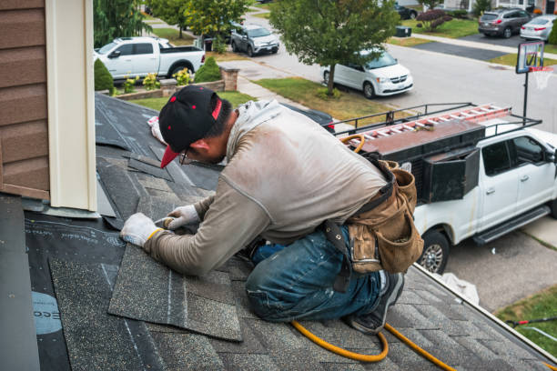 Professional Storm Damage Roof Repair technician working in Fairview, CA